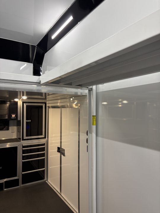 New 2027 Haulmark EDGE 28 Stacker Race Trailer, Finished Race Interior, 21K GVWR, Awnings, Lift