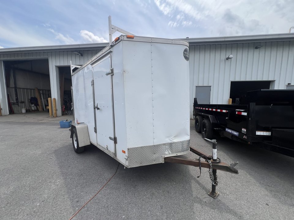 Used 2015 Wells Cargo 6x10 3K Ramp Door Cargo / Enclosed Trailer
