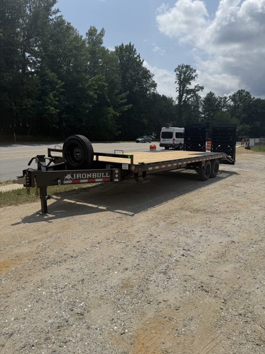 New 2027 Iron Bull Deck Over Trailer / 102" Wide x 25' Long (20' Flat, 5' Dovetail) / 2-8,000# Electric Brake Axles / Rampage Ramps / 215/75r17.5" Tires and Wheels / Matching Spare Tire and Wheel