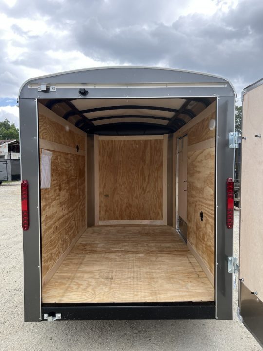 New 2026 Homesteader Trailer / Challenger Series / 5x8 / 5'7" Interior Height / Single Swing Rear Door / 32" Side Door / 24" Stoneguard / .030 Charcoal Gray Aluminum