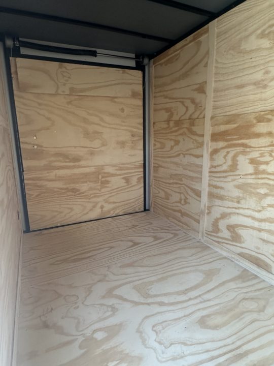 New 2026 6X12 SINGLE AXLE ENCLOSED TRAILER WITH BLACKOUT PACKAGE AND 7' ROOF
