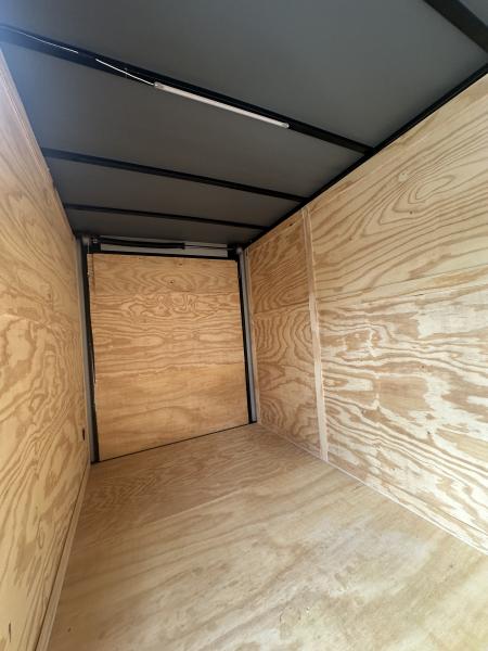 New 2026 6X12 SINGLE AXLE ENCLOSED TRAILER WITH BLACKOUT PACKAGE AND 7' ROOF