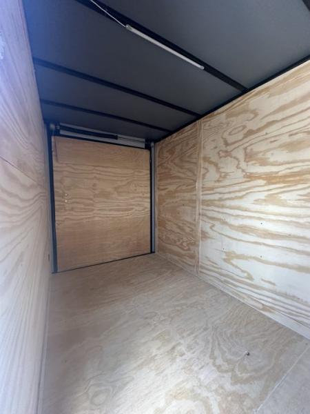 New 2026 6X12 SINGLE AXLE ENCLOSED TRAILER WITH BLACKOUT PACKAGE AND 7' ROOF