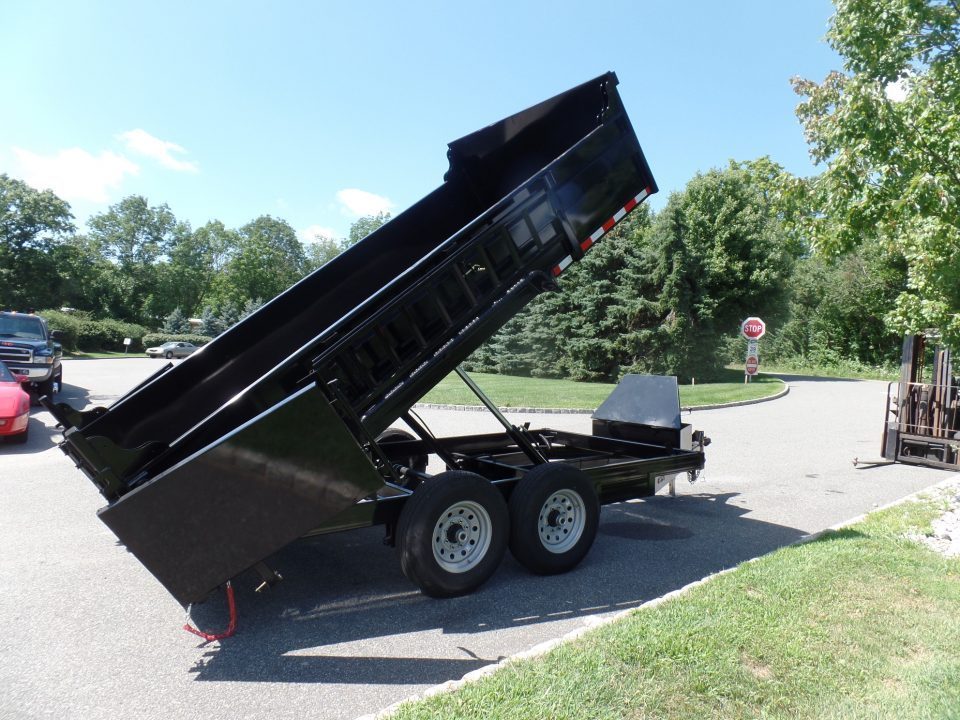 New 2026 Quality Steel and Aluminum 7X12 with 2' sides, 12,000 lb. GVWR , Extra Framing! Dump Trailer