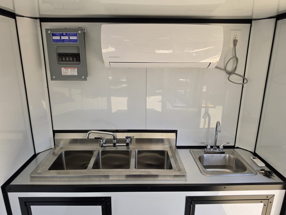 New 2026 New 6X14 SA Screwless Enclosed Vending Trailer | Blackout | Spoiler Package | 50 AMP Electric Pkg. w/Mini Split & Sink Pkg. | .08 Polycor | Dexter Axle | 1167