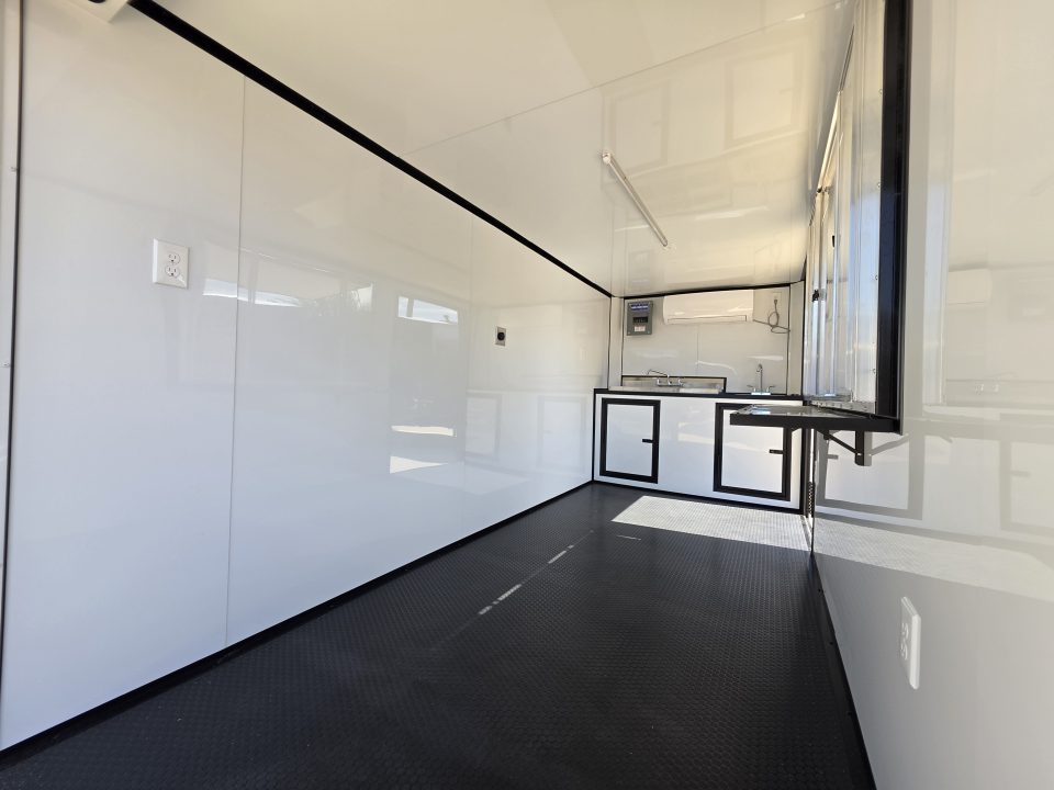 New 2026 New 6X14 SA Screwless Enclosed Vending Trailer | Blackout | Spoiler Package | 50 AMP Electric Pkg. w/Mini Split & Sink Pkg. | .08 Polycor | Dexter Axle | 1167