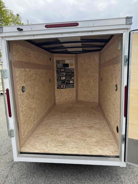 New 2026 Wells Cargo FT58S2-D Cargo / Enclosed Trailer