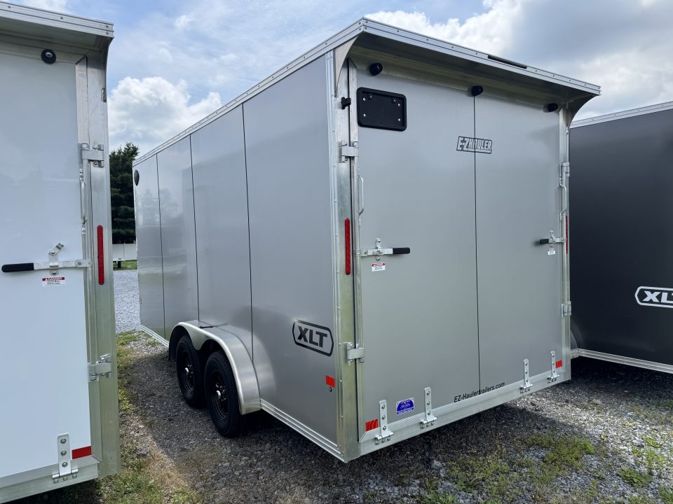 New 2027 E-Z Hauler EZEC7.5X16 XLT-P Cargo / Enclosed Trailer 71 SERIES 7 FOOT 1 INCH INTERIOR HEIGHT .080 POLY SIDES TRANSLUCENT ROOF REAR CANOPY FREE ALUMINUM WHEEL UPGRADE