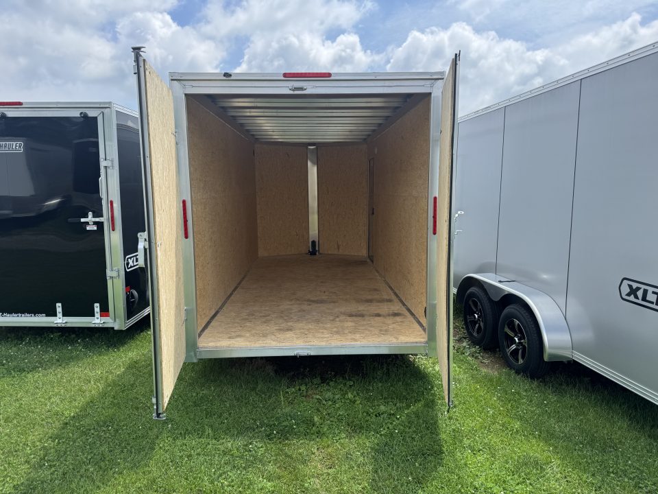 New 2027 E-Z Hauler EZEC7X16 XLT-BDP Cargo / Enclosed Trailer 71 SERIES 7 FOOT 1 INCH INTERIOR HEIGHT .080 POLY SIDES FREE ALUMINUM WHEEL UPGRADE REAR DOUBLE DOORS