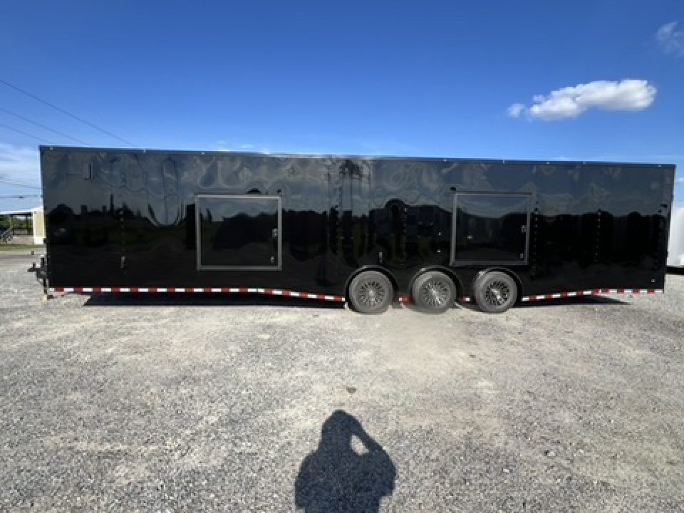 New 2027 Rock Solid Cargo 8.5x36 Triple Axle Enclosed Car Hauler – Black Polycore Super Stealth Blackout Package