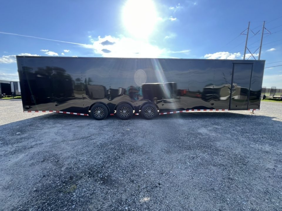 New 2027 Rock Solid Cargo 8.5x36 Triple Axle Enclosed Car Hauler – Black Polycore Super Stealth Blackout Package