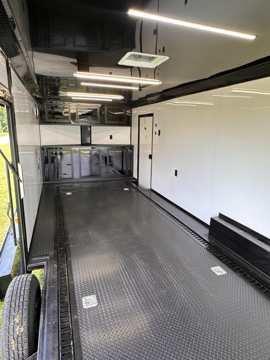 New 2026 Luxe 8.5x28 Race Trailer - Finished Interior- 7000lb Spread Torsion - Recessed E-Track-Full Escape Door-Removable Fender