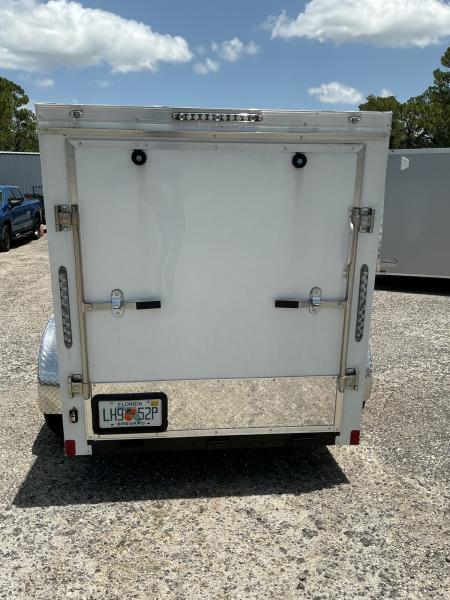 Used 2025 NationCraft Trailers 5X8 Enclosed white single axle trailer