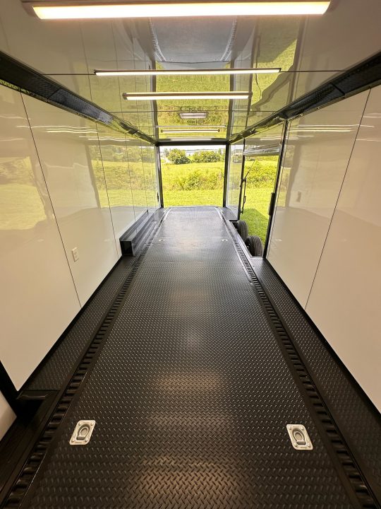 New 2026 Luxe 8.5x28 Race Trailer - Finished Interior- 7000lb Spread Torsion - RECESSED E-TRACK-Full Escape Door--Removable Fender