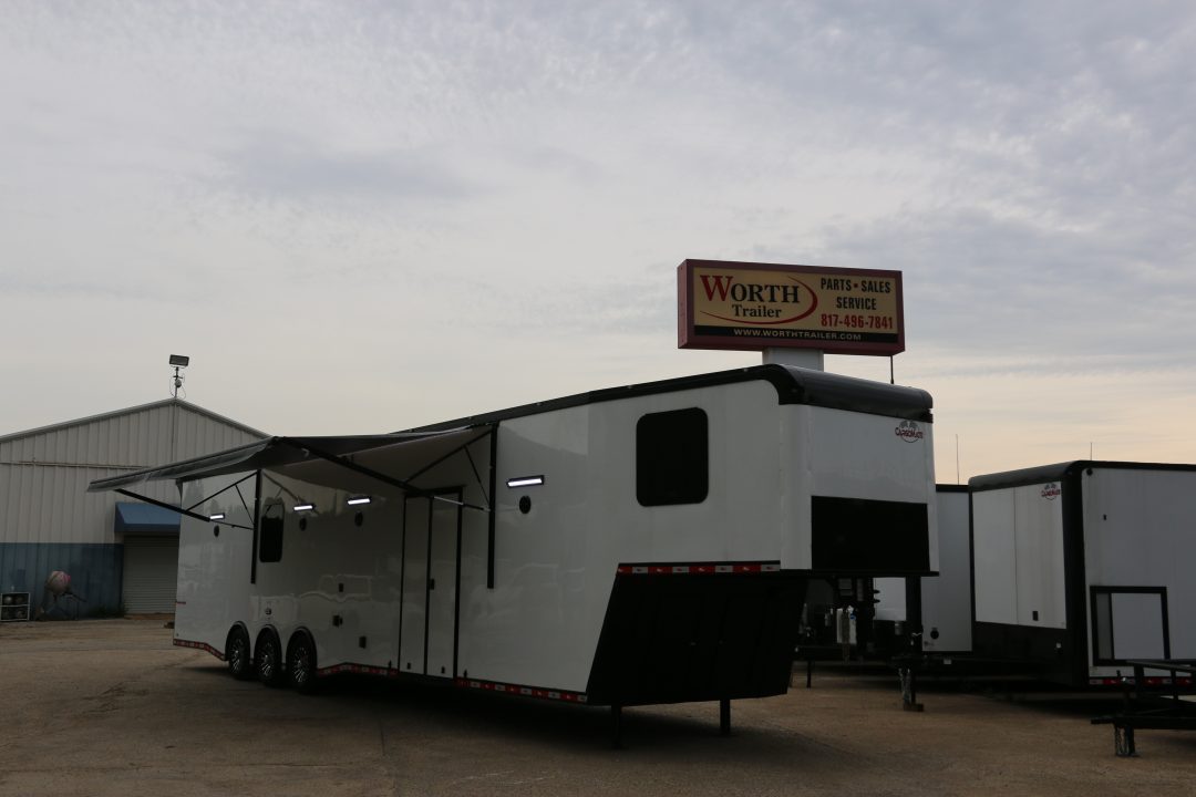 New 8.5 X 44 ELIMINATOR SS RACE TRAILER W/ BATH, BED AND MUCH MORE