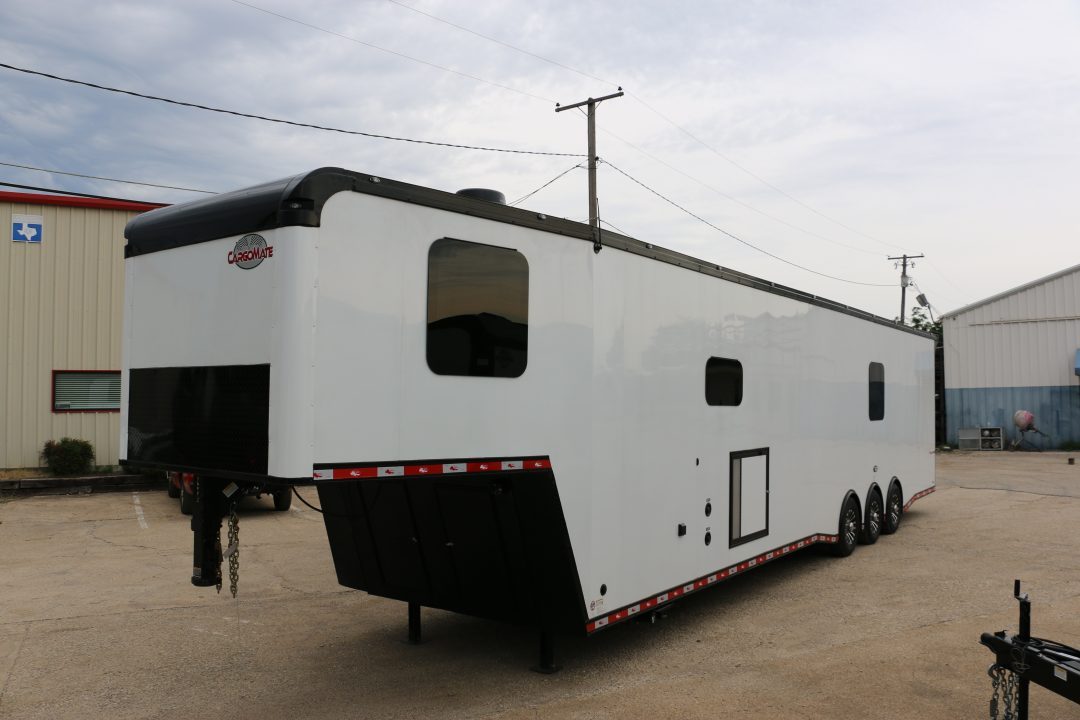 New 8.5 X 44 ELIMINATOR SS RACE TRAILER W/ BATH, BED AND MUCH MORE