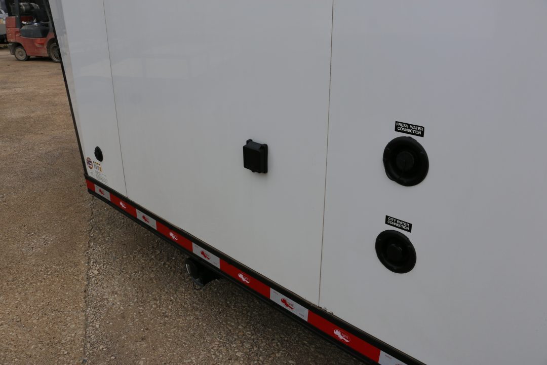 New 8.5 X 44 ELIMINATOR SS RACE TRAILER W/ BATH, BED AND MUCH MORE