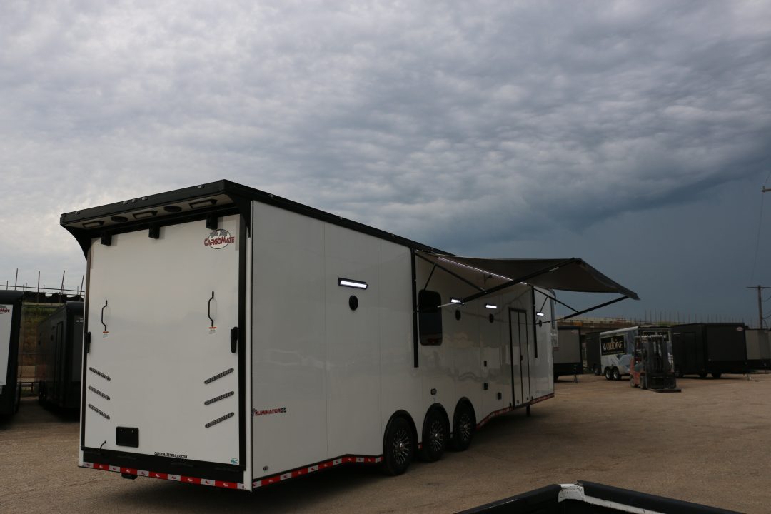 New 8.5 X 44 ELIMINATOR SS RACE TRAILER W/ BATH, BED AND MUCH MORE
