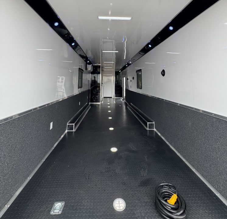New 8.5 X 44 ELIMINATOR SS RACE TRAILER W/ BATH, BED AND MUCH MORE
