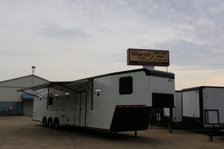 New 8.5 X 44 ELIMINATOR SS RACE TRAILER W/ BATH, BED AND MUCH MORE