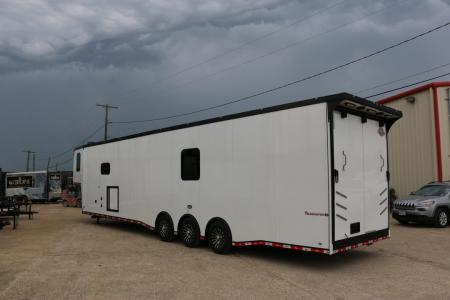 New 8.5 X 44 ELIMINATOR SS RACE TRAILER W/ BATH, BED AND MUCH MORE