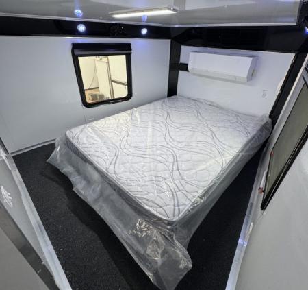 New 8.5 X 44 ELIMINATOR SS RACE TRAILER W/ BATH, BED AND MUCH MORE