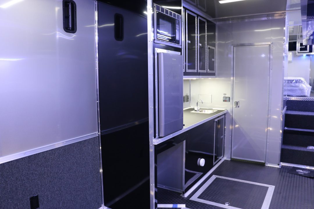 New 2026 Cargo Mate 8.5 X 44 ELIMINATOR SS RACE TRAILER W/ BATH, BED AND MUCH MORE