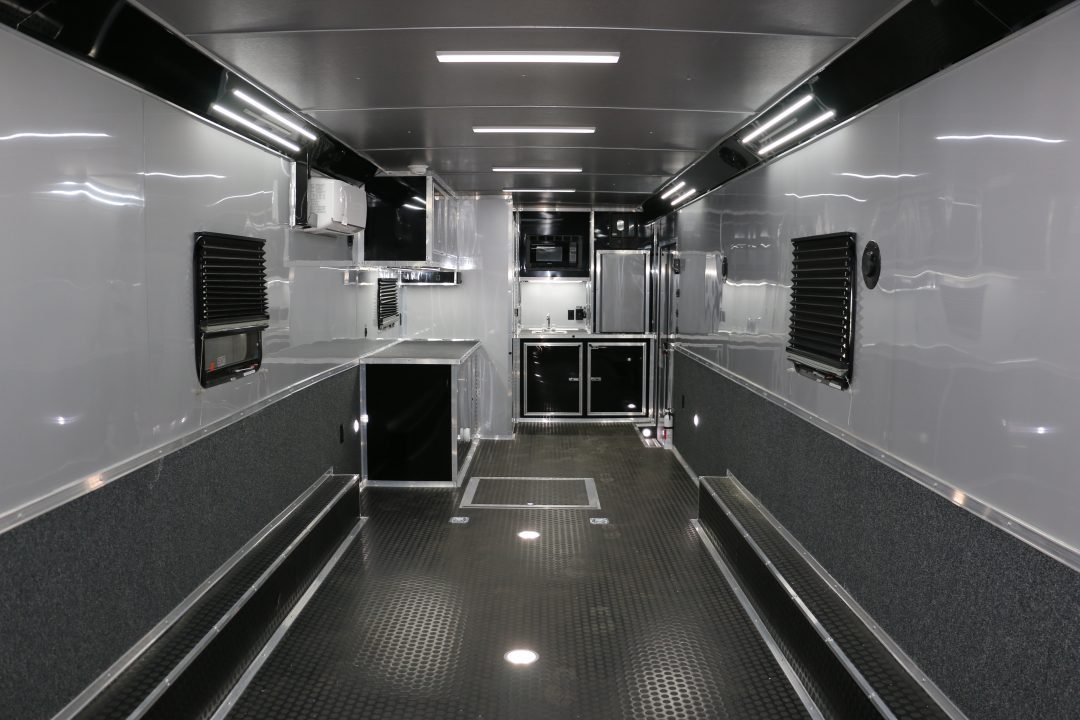 New 8.5"x34' ELIMINATOR SS W/BATHROOM, MINI SPLIT, AWNING AND MORE!
