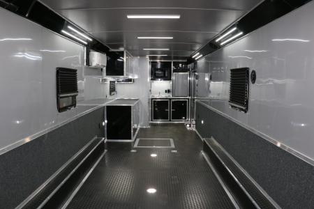 New 8.5"x34' ELIMINATOR SS W/BATHROOM, MINI SPLIT, AWNING AND MORE!