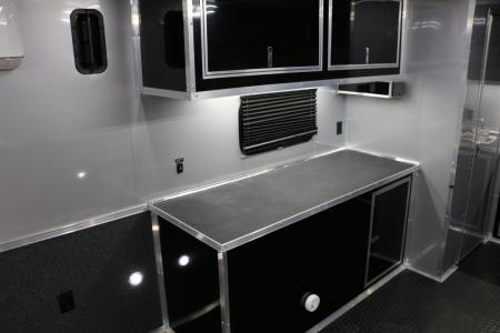 New 8.5"x34' ELIMINATOR SS W/BATHROOM, MINI SPLIT, AWNING AND MORE!