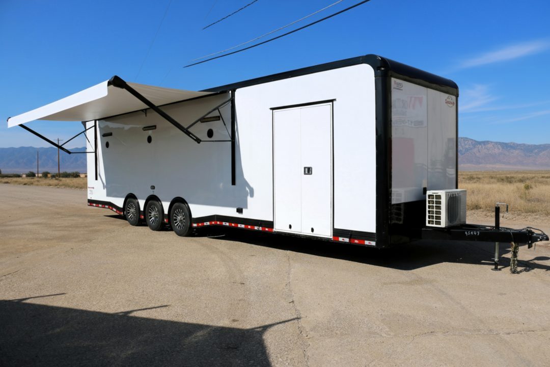 New 8.5X34 CARGO MATE ELIMINATOR SS RACE TRAILER mini split,awning,subwoofers,and more