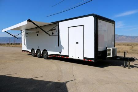 New 8.5X34 CARGO MATE ELIMINATOR SS RACE TRAILER mini split,awning,subwoofers,and more
