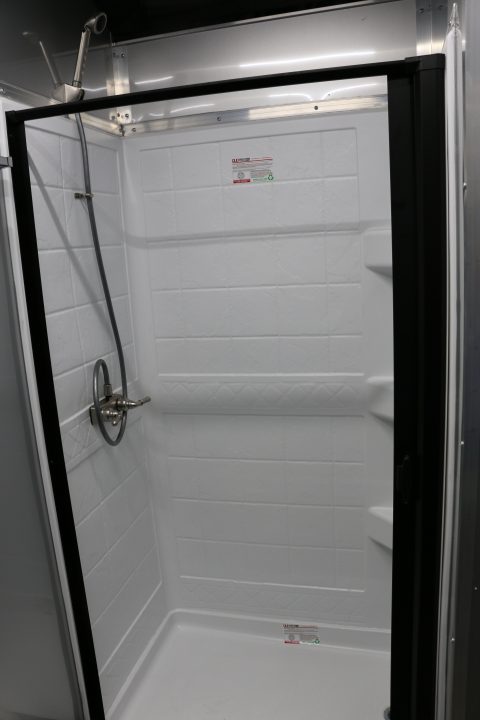 New 8.5x52' ELIMINATOR SS WITH LIVING QUARTERS, MINI SPLIT, KITCHEN, AWNING, AND MORE!!!