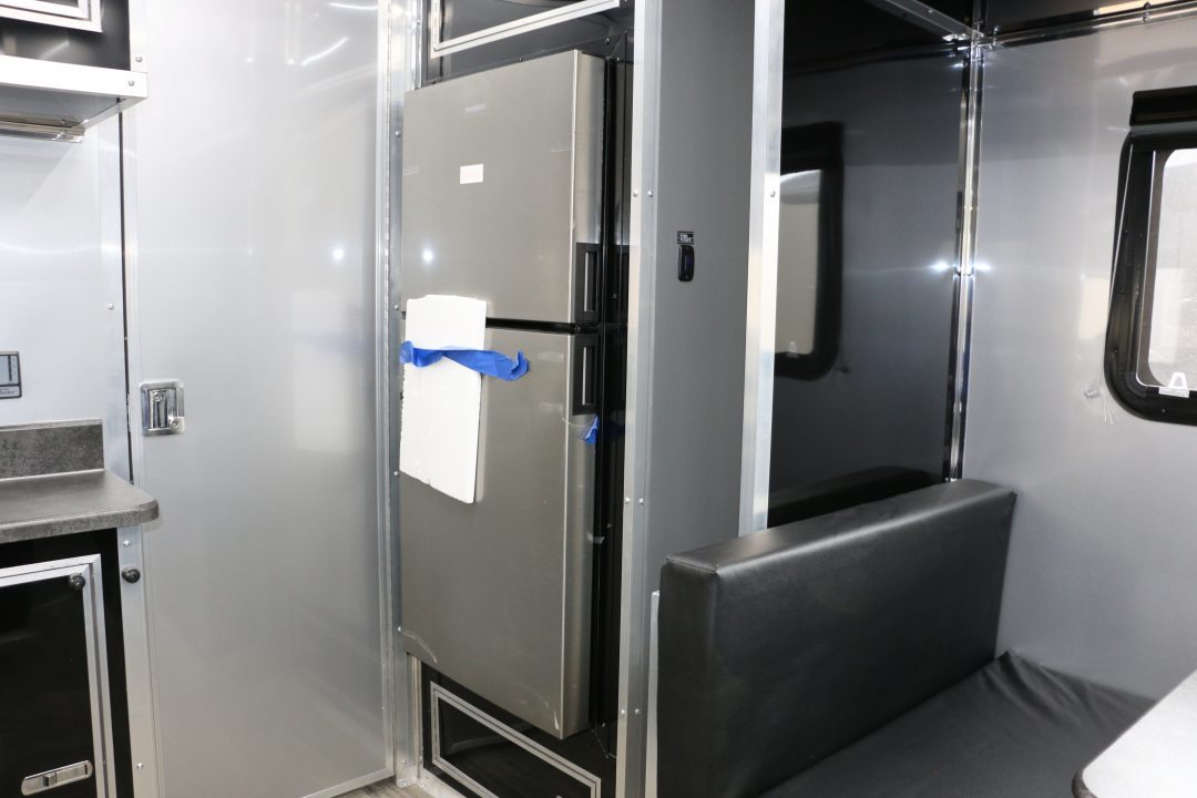 New 8.5x52' ELIMINATOR SS WITH LIVING QUARTERS, MINI SPLIT, KITCHEN, AWNING, AND MORE!!!