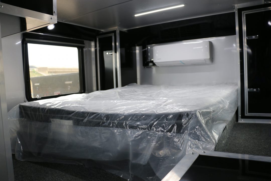 New 8.5x52' ELIMINATOR SS WITH LIVING QUARTERS, MINI SPLIT, KITCHEN, AWNING, AND MORE!!!