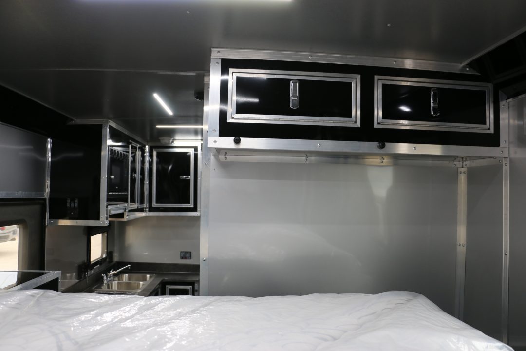 New 8.5x52' ELIMINATOR SS WITH LIVING QUARTERS, MINI SPLIT, KITCHEN, AWNING, AND MORE!!!