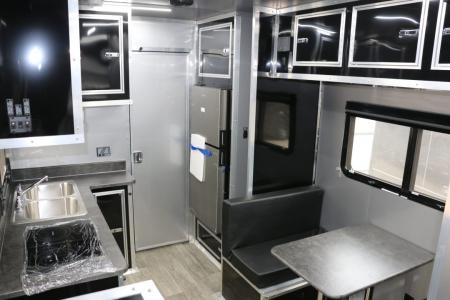 New 8.5x52' ELIMINATOR SS WITH LIVING QUARTERS, MINI SPLIT, KITCHEN, AWNING, AND MORE!!!