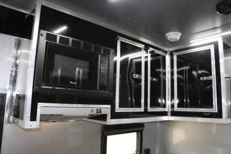 New 8.5x52' ELIMINATOR SS WITH LIVING QUARTERS, MINI SPLIT, KITCHEN, AWNING, AND MORE!!!