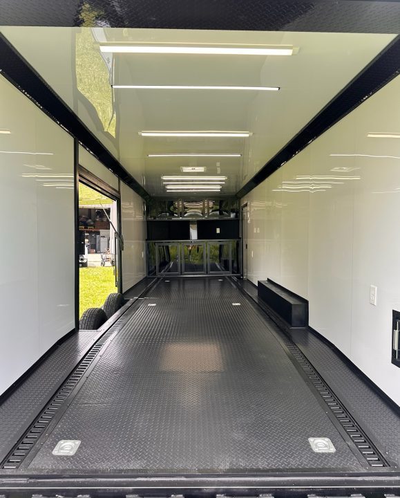 New 2026 Luxe 8.5x28 Race Trailer - Finished Interior- 7000lb Spread Torsion - Recessed E-Track-Full Escape Door-Removable Fender