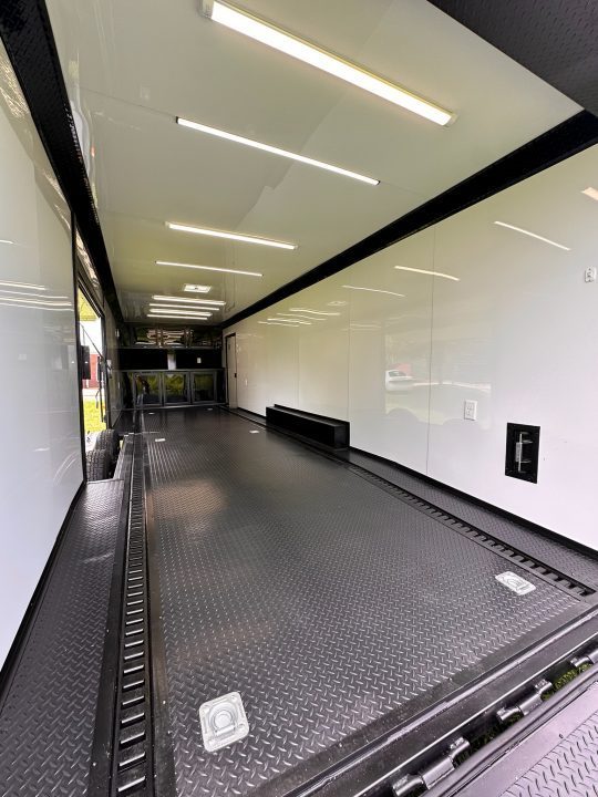 New 2026 Luxe 8.5x28 Race Trailer - Finished Interior- 7000lb Spread Torsion - Recessed E-Track-Full Escape Door-Removable Fender