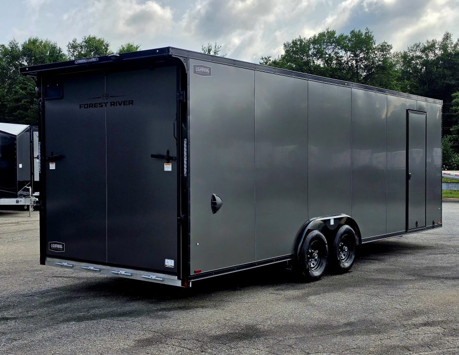 New 8 X 24 CAR HAULER ENCLOSED 2027 LIGHTNING 5200# AXLES POLY COMPOSITE EXTERIOR ALL ALUMINUM