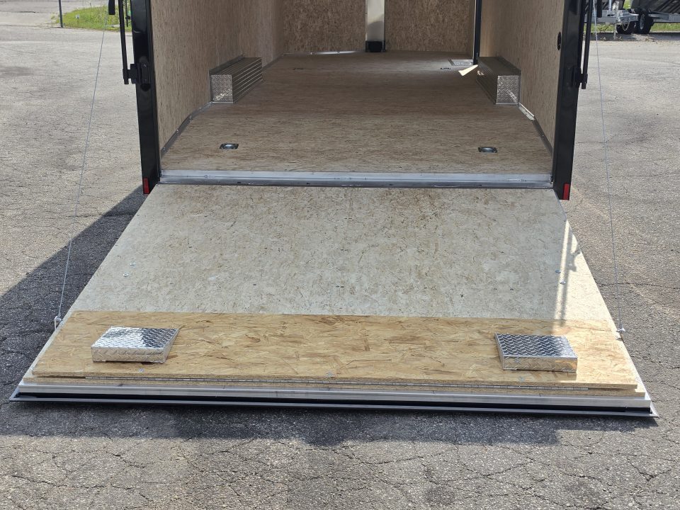 New 8 X 24 CAR HAULER ENCLOSED 2027 LIGHTNING 5200# AXLES POLY COMPOSITE EXTERIOR ALL ALUMINUM