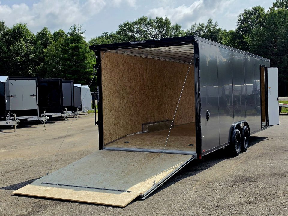 New 8 X 24 CAR HAULER ENCLOSED 2027 LIGHTNING 5200# AXLES POLY COMPOSITE EXTERIOR ALL ALUMINUM