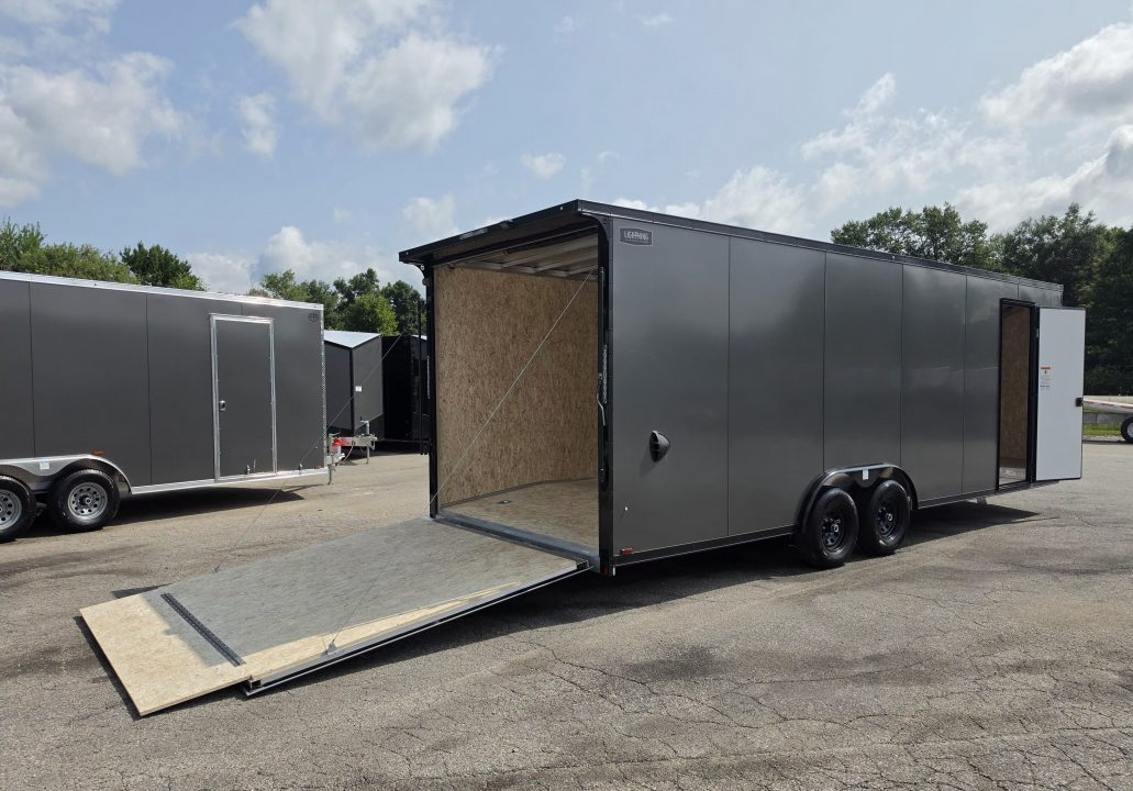 New 8 X 24 CAR HAULER ENCLOSED 2027 LIGHTNING 5200# AXLES POLY COMPOSITE EXTERIOR ALL ALUMINUM