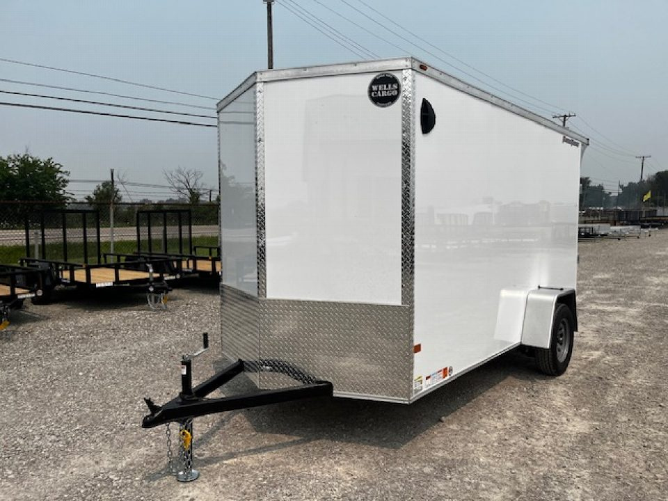 New 2026 Wells Cargo 6x12 3K FastTrac Deluxe Enclosed Trailer