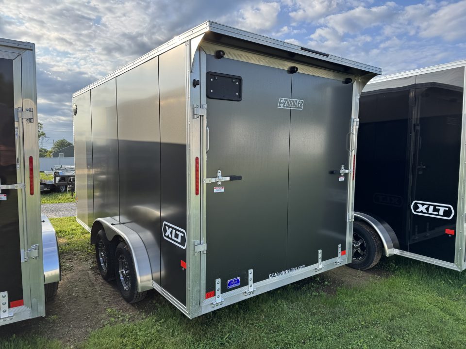 New 2027 E-Z Hauler EZEC7.5X14 XLT-P Cargo / Enclosed Trailer 71 SERIES 7 FOOT 1 INCH INTERIOR HEIGHT, .080 POLY SIDES, TRANSLUCENT ROOF, REAR DOOR CANOPY, FREE ALUMINUM WHEEL UPGRADE