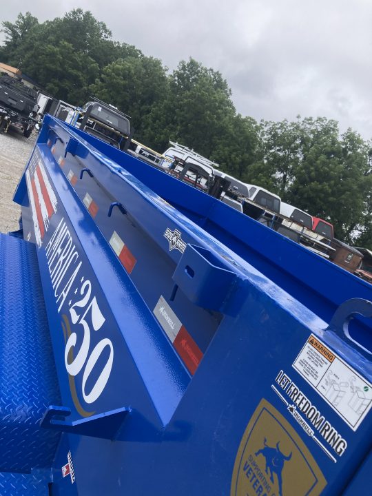 New 2027 Iron Bull DWB8314072 America 250 Series Dump Trailer /Hyd Jack / Wireless Remote / Solar Panel / 36" High Sides / 2-7k Electric Brake Axles / tarp / Alum Ramps / Combo Gate / Powder Coat Blue