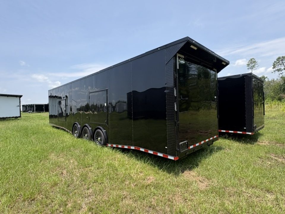 New 2027 Rock Solid Cargo 8.5x36 Triple Axle Enclosed Car Hauler – Black Polycore | Super Stealth Blackout Edition