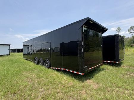 New 2027 Rock Solid Cargo 8.5x36 Triple Axle Enclosed Car Hauler – Black Polycore | Blackout Package