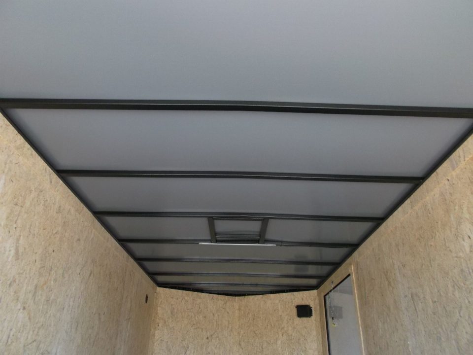 New 2027 Covered Wagon Trailers 7x14 Cargo Trailer / Enclosed Trailer / 7ft Interior / Extra Wide Ramp / 48" RV Side Door / .080 Black Poly Core Skin / Black Out Package / Rear Spoiler w/ LED Loading Lights